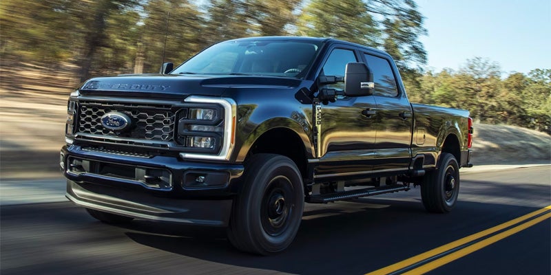 Ford F-250 driving on road