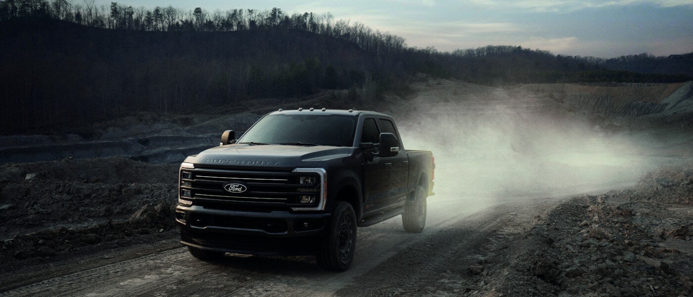 2027 Ford Super Duty driving on dusty road